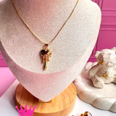 Collar y aretes en rodio color dorado