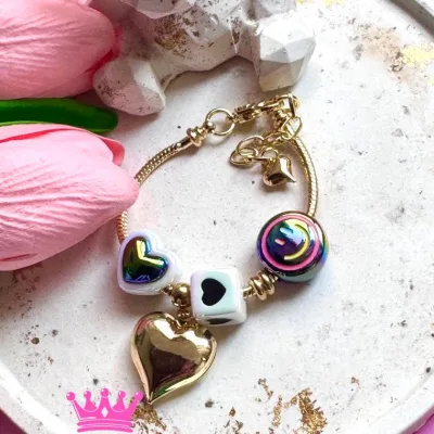 Pulsera tipo pandora en rodio y dijes en resina