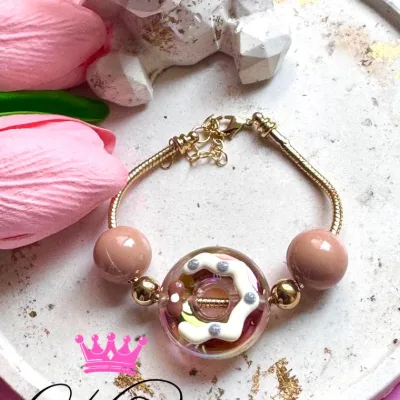 Pulsera tipo Pandora en rodio y maxi dona en resina con abaco# 16