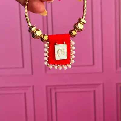 Pulsera escapulario con la palabra Fe